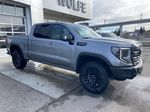 Gray[Sterling Metallic] 2023 GMC Sierra 1500 AT4-X Right Side Photo in Calgary AB