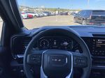 White[Summit White] 2024 GMC Sierra 1500 Steering Wheel and Dash Photo in Calgary AB