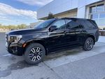 Black[Onyx Black] 2023 GMC Yukon XL AT4 Left Front Corner Photo in Calgary AB