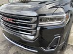 Black[Ebony Twilight Metallic] 2023 GMC Acadia Left Front Head Light / Bumper and Grill in Calgary AB