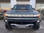 Green[Moonshot Green Matte] 2024 GMC Hummer EV SUV Front Vehicle Photo in Calgary AB