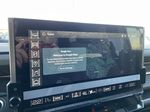 Green[Moonshot Green Matte] 2024 GMC Hummer EV SUV Navigation Screen Closeup Photo in Calgary AB