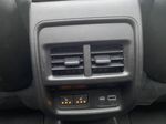 Black[Stellar Black Metallic] 2023 Cadillac XT4 Steering Wheel and Dash Photo in Brandon MB