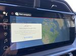 White[White Frost Tricoat] 2024 GMC Sierra 1500 Denali Navigation Screen Closeup Photo in Calgary AB