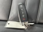 White[White Platinum Metallic Tri-Coat] 2019 Ford Escape Key and Fob Photo in Edmonton AB