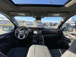 Gray[Titanium Rush Metallic] 2024 GMC Sierra 1500 Denali Strng Wheel/Dash Photo: Frm Rear in Calgary AB