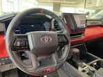 Black[Midnight Black Metallic] 2023 Toyota Tundra Steering Wheel and Dash Photo in Kelowna BC