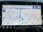 White[Iridescent Pearl Tricoat] 2024 Chevrolet Equinox Navigation Screen Closeup Photo in Edmonton AB