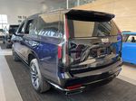 Blue[Dark Moon Blue Metallic] 2023 Cadillac Escalade Left Rear Corner Photo in Edmonton AB