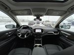 Black[Ebony Twilight Metallic] 2024 GMC Terrain Denali Strng Wheel/Dash Photo: Frm Rear in Calgary AB