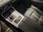 RHODIUM WHITE METALLIC(51K-KH3)-BLACK 2024 Mazda CX-90 PHEV GT AWD Center Console Photo in Edmonton AB