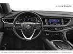 Gray[Moonstone Grey Metallic] 2024 Buick Enclave Steering Wheel and Dash Photo in Medicine Hat AB