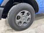 Blue[Velocity Blue Metallic] 2024 Ford Bronco Left Front Rim and Tire Photo in Dartmouth NS