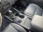 White[Glacier White] 2022 Nissan Frontier Center Console Photo in Kelowna BC