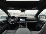 Gray[Sterling Metallic] 2023 GMC Sierra 1500 AT4X Strng Wheel/Dash Photo: Frm Rear in Calgary AB