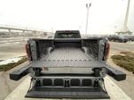 Gray[Sterling Metallic] 2024 GMC Sierra 3500HD AT4 Trunk / Cargo Area Photo in Calgary AB