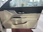 White[Crystal White Tricoat] 2024 Cadillac CT4 Right Front Interior Door Panel Photo in Edmonton AB