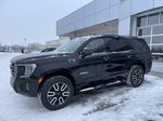 Black[Onyx Black] 2024 GMC Yukon AT4 Left Front Corner Photo in Calgary AB