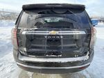 Black[Black] 2024 Chevrolet Tahoe LT Rear of Vehicle Photo in Calgary AB