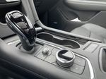 Green[Emerald Lake Metallic] 2024 Cadillac XT6 Sport Center Console Photo in Calgary AB