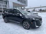 Green[Emerald Lake Metallic] 2024 Cadillac XT6 Sport Right Front Corner Photo in Calgary AB