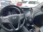 Silver[Sparkling Silver] 2016 Hyundai Santa Fe Sport Steering Wheel and Dash Photo in Edmonton AB