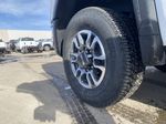 White[Summit White] 2024 GMC Sierra 2500HD Left Front Rim and Tire Photo in Edmonton AB