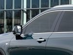 Green[Emerald Lake Metallic] 2024 Cadillac XT4 Left Front Interior Photo in Edmonton AB