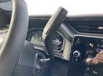 Black[Onyx Black] 2024 GMC Sierra 3500HD AT4 Center Console Photo in Calgary AB