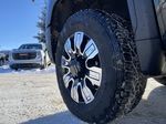 Black[Onyx Black] 2024 GMC Sierra 2500HD Left Front Rim and Tire Photo in Edmonton AB