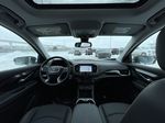 Gray[Sterling Metallic] 2024 GMC Terrain AT4 Strng Wheel/Dash Photo: Frm Rear in Calgary AB