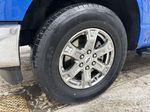 Blue[Velocity Blue Metallic] 2021 Ford F-150 Left Front Rim and Tire Photo in Dartmouth NS