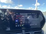 Blue[Fountain Blue] 2024 Chevrolet Trax 1RS Radio Controls Closeup Photo in Calgary AB