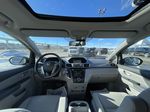 Gray[Modern Steel Metallic] 2016 Honda Odyssey Touring Strng Wheel/Dash Photo: Frm Rear in Calgary AB