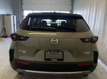 ZIRCON SAND METALLIC(48T-VA7)-TERRACOTA 2024 Mazda CX-50 Rear of Vehicle Photo in Edmonton AB
