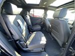 Black[Mosaic Black Metallic] 2024 Chevrolet Traverse Limited RS Right Side Rear Seat  Photo in Calgary AB