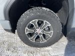 Gray[Thunderstorm Grey] 2024 GMC Sierra 1500 Pro Left Front Rim and Tire Photo in Calgary AB