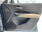 Blue[Deep Sea Metallic] 2024 Cadillac XT4 Luxury Right Front Interior Door Panel Photo in Calgary AB