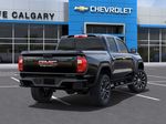 Black[Onyx Black] 2024 GMC Canyon Denali Rear of Vehicle Photo in Calgary AB