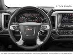 Blue[Stone Blue Metallic] 2017 GMC Sierra 1500 Steering Wheel and Dash Photo in Fort Macleod AB