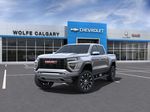 Gray[Sterling Metallic] 2024 GMC Canyon Denali Left Front Corner Photo in Calgary AB