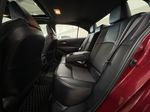 Red[Finish Line Red w/Black Roof] 2022 Toyota Corolla XSE Left Side Rear Seat  Photo in Sherwood Park AB
