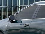 Green[Emerald Lake Metallic] 2024 Cadillac XT5 Left Front Interior Photo in Edmonton AB