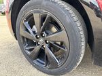 Red[Brilliant Red] 2025 Buick Envision Left Front Rim and Tire Photo in Edmonton AB