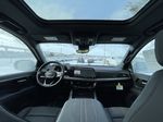 Blue[Lakeshore Blue Metallic] 2025 Chevrolet Tahoe High Country Strng Wheel/Dash Photo: Frm Rear in Calgary AB