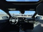 White[Summit White] 2025 Buick Envista Sport Touring Strng Wheel/Dash Photo: Frm Rear in Calgary AB