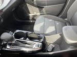 Black[Mosaic Black Metallic] 2025 Chevrolet Trax Center Console Photo in Edmonton AB