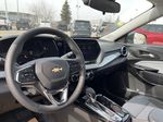 Black[Mosaic Black Metallic] 2025 Chevrolet Trax Steering Wheel and Dash Photo in Edmonton AB