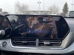 Black[Mosaic Black Metallic] 2025 Chevrolet Trax Radio Controls Closeup Photo in Edmonton AB