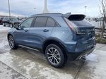 Blue[Deep Sea Metallic] 2025 Cadillac XT4 Sport Left Front Rim and Tire Photo in Calgary AB